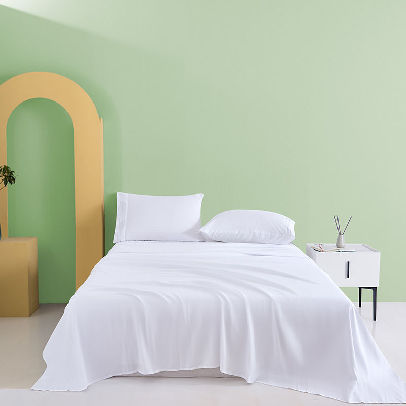 Parure de lit quatre pièces en tissu tissé pour une personne
