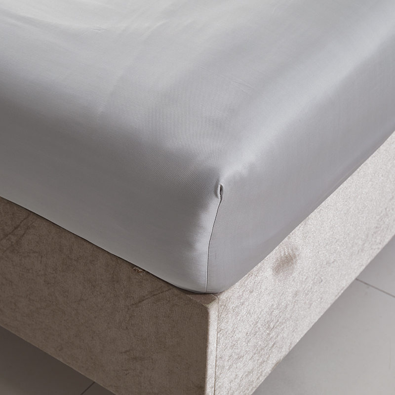 Ensemble de draps en pur coton peigné évacuant l'humidité