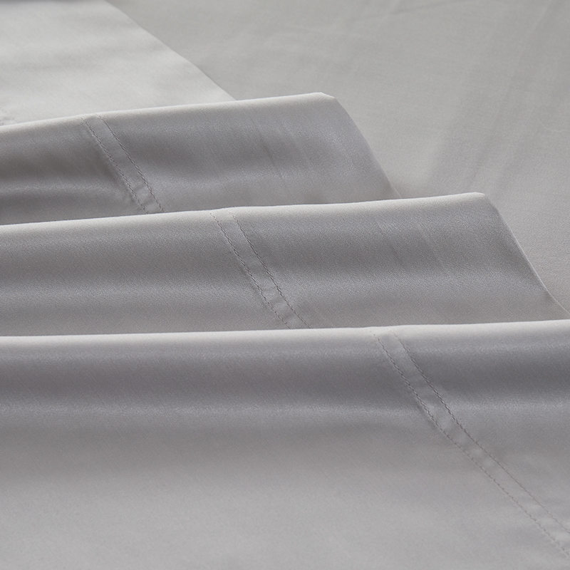 Ensemble de draps en pur coton peigné évacuant l'humidité