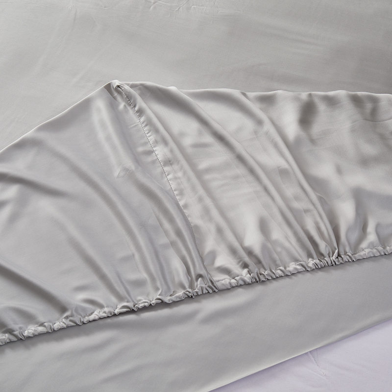 Ensemble de draps en pur coton peigné évacuant l'humidité